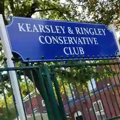 Post and panel sign outside conservative club