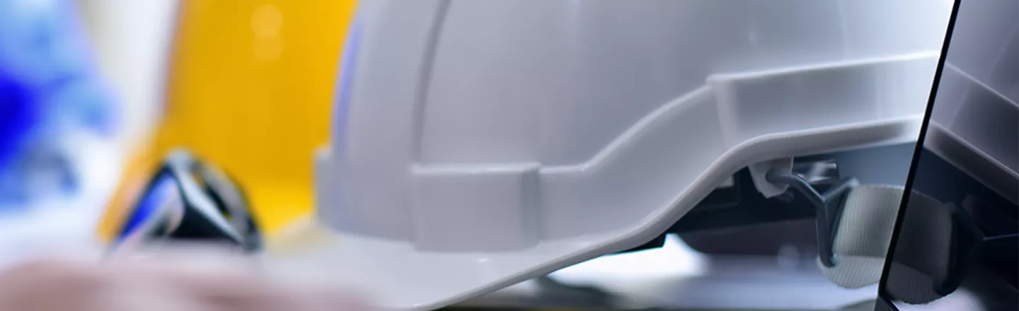 image of hard hat and laptop during a site survey