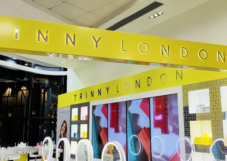 Retail store with chrome signage on silver background